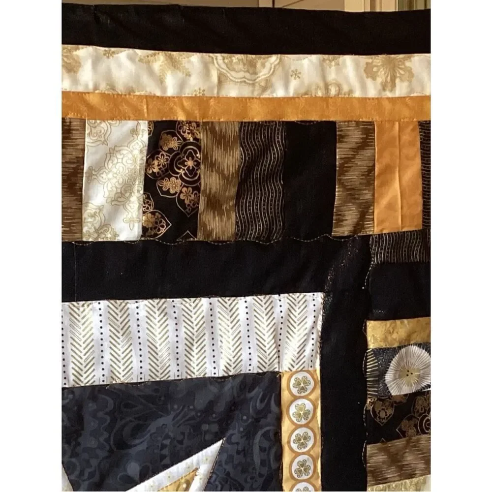 NWT. Gold and Black Star Lap Quilt